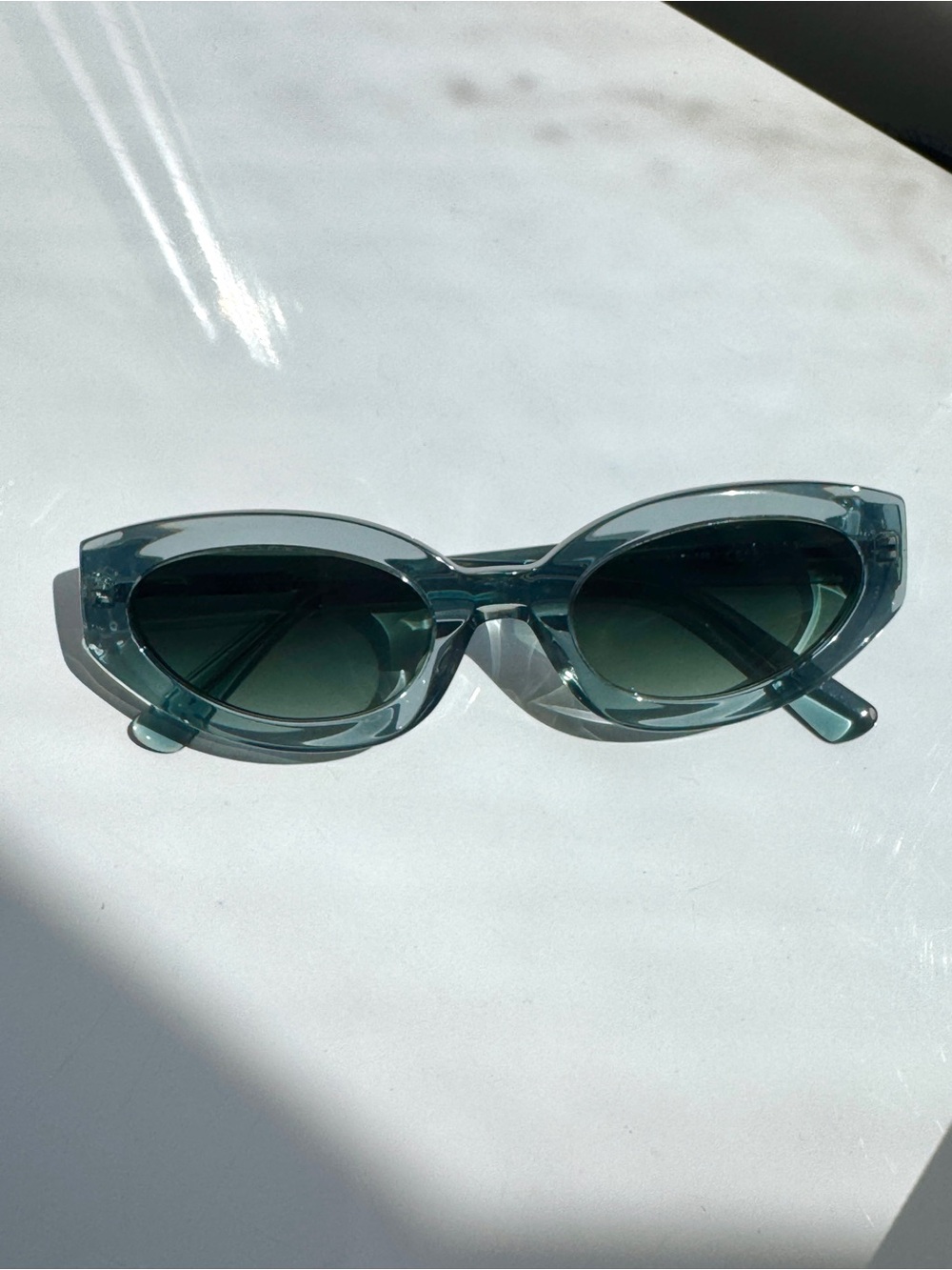 10 Crosby Derek Lam Translucent Light Blue Oval Sunglasses